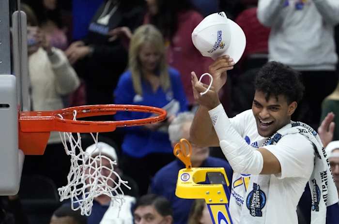 KansasRemyMartinCutNets2022